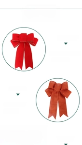 Detail of red flocking and linen Christmas bow with metallic twist tie for tree decor