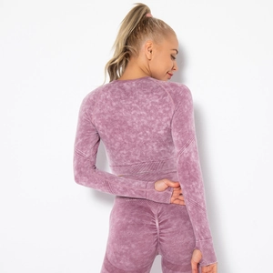 Close-up of lilac acid wash yoga set featuring back scrunch and thumb hole details