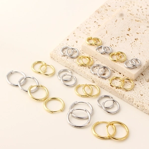 Detailed set of silver and gold S925 sterling silver hoop earrings in various sizes