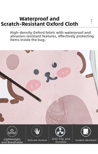 Detail of high-density waterproof Oxford cloth with cute cartoon pig print for travel bag