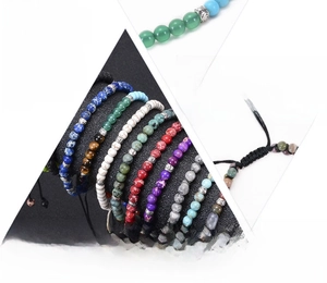 Close-up of mixed natural stone beads with vintage silver spacers and elastic yoga design