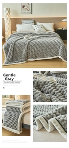 Detail view of thick grey bubble fleece blanket with high-density textured texture