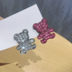 Glittering bear-shaped hair clips with rhinestones in silver and pink colors