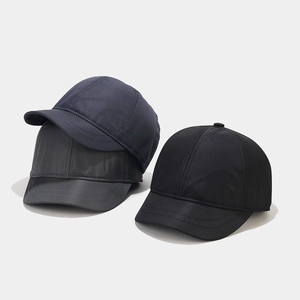 Three minimalist short brim baseball caps in navy, grey and black functional fabric