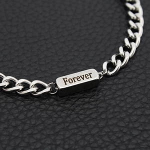 Polished stainless steel Cuban chain bracelet with Forever engraved plaque on leather