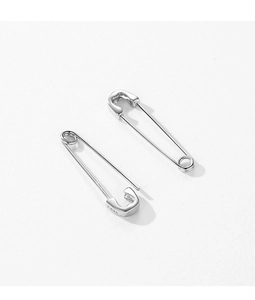 Detail showing S925 hallmark on minimalist sterling silver safety pin earrings