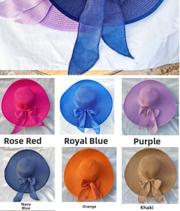 Dettaglio di cappelli da sole a tesa larga in sei colori con eleganti fiocchi di seta