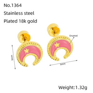 Detailed view of 18k gold plated stainless steel star and moon stud earrings with pink enamel