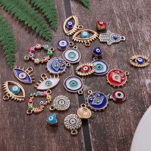 Assorted alloy Evil Eye and Hamsa Hand charms with colorful enamel and rhinestones