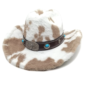 Close-up of cow print felt cowboy hat with bull head buckle and turquoise accents