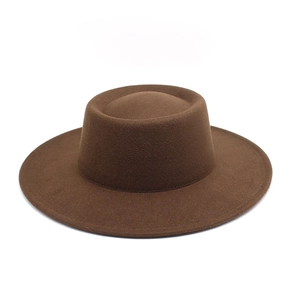 Detail of the flat crown and structured brim of this dark brown wool felt fedora hat