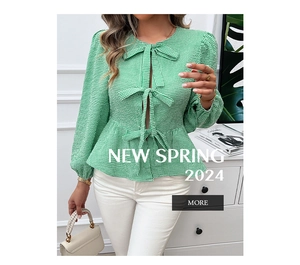 Detail of green gingham peplum top with front bow ties and stylish puff sleeves