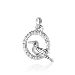 Detailed view of silver hummingbird pendant with sparkling cubic zirconia on white background