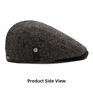Detailed side view of vintage men's newsboy hat with herringbone texture and metal button