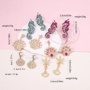 Detailed overview of seahorse and starfish earrings with dimensions and weight specs