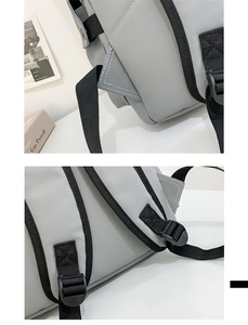 Detail view of the durable gray nylon fabric and reinforced stitching on the backpack