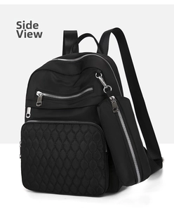 Sac à dos noir en oxford pour femme avec poche matelassée et petite pochette vue de profil