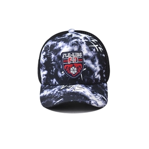 Detail of retro graffiti baseball cap with tie-dye pattern and embroidered F3 shield patch