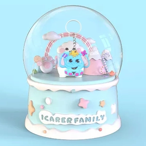 Cute PVC forest elephant keychain with pink bow charm and silver keyring on blue base