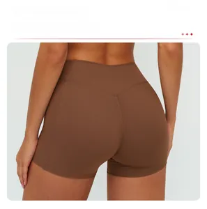 Detail showing high-waisted design and V-shaped seam for lifting silhouette on yoga shorts