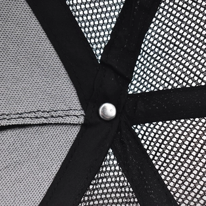 Macro detail of cotton baseball cap inner crown with metal rivet and mesh paneling