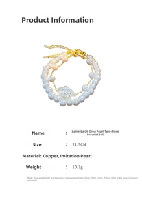 Detail shot of the camellia flower pendant and faux pearl beads on the stylish bracelet set