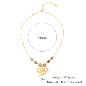 Detailed size specifications for gold bow necklace with opal beads and steel stamp