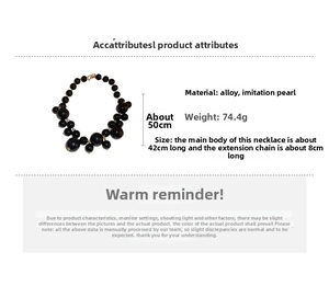 Detail of chunky black imitation pearl necklace with adjustable alloy extender chain