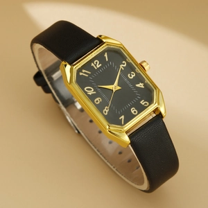 Close-up of a women's square quartz watch with a gold case, black dial, and leather strap