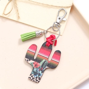 Wooden cactus keychain with leopard and stripe prints, green tassel, and silver ring