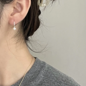 Minimalist 925 sterling silver leaf hoop earrings for women shown worn on ear