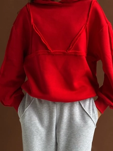 Women's bright red hooded sweatshirt in Y2K style with minimalist breast design and loose fit