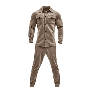Detail of khaki corduroy jacket set showing fabric texture and ribbed surface finish