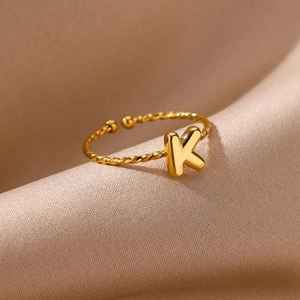 18K gold plated adjustable stainless steel ring featuring a twisted band and letter K