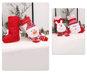 Detail view of festive Christmas stockings with 3D Santa, Snowman and Reindeer dolls