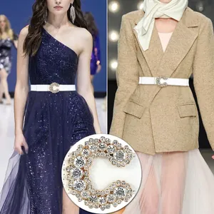 Elegant white elastic belt with a rhinestone-studded C-buckle for dresses and coats