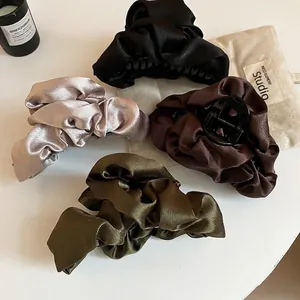 Elegant ruched satin cloud claw clips in black, coffee, cream gold, and olive green
