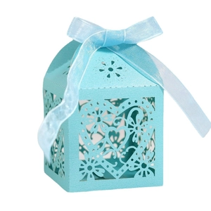 Sky blue heart-shaped laser cut wedding candy box with silk ribbon bow decoration