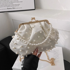 Elegant white satin pearl shell handbag with golden metal frame and chain strap