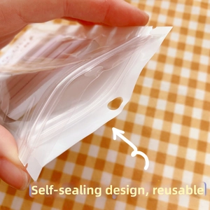 Detail of reusable self-sealing transparent packaging bag with functional seal strip