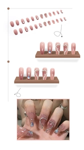 Pink gradient long press-on nails set with teardrop crystals and heart detail design