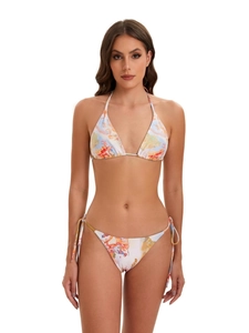 Three-piece floral bikini set with halter top and side-tie bottoms in abstract orange patterns