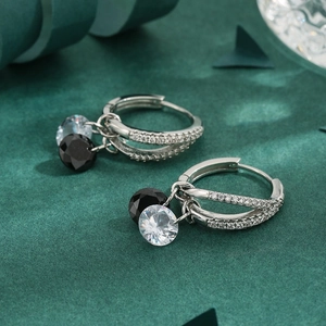 Elegant silver double hoop earrings with sparkling zircons and black and clear charms
