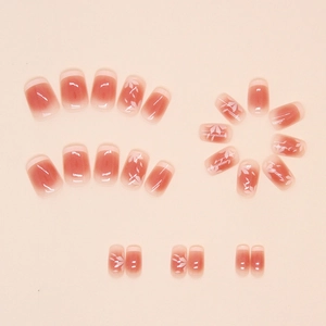 Detail of 24pcs gradient pink press-on nails with white flower patterns and French tips