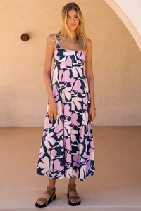 Detail of square neckline and wide straps on a purple floral midi sundress