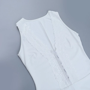 Detailed view of floral lace splicing and deep V-neck on a white sleeveless bodysuit