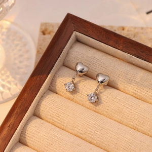 Elegant silver heart stud earrings with sparkling round zircon tassels in jewelry box
