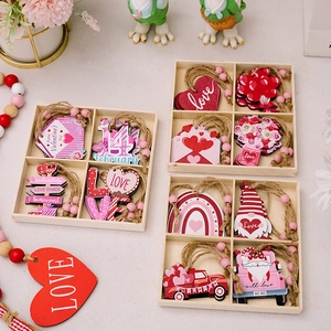Pink wooden Valentine's Day ornaments set in gift boxes with hearts and gnomes