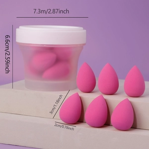 Detailed size specifications of pink teardrop makeup sponges with a frosted storage jar