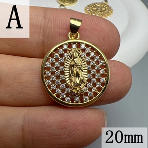 Close-up of 20mm round Virgin Mary pendant with cubic zirconia inlay and gold plating